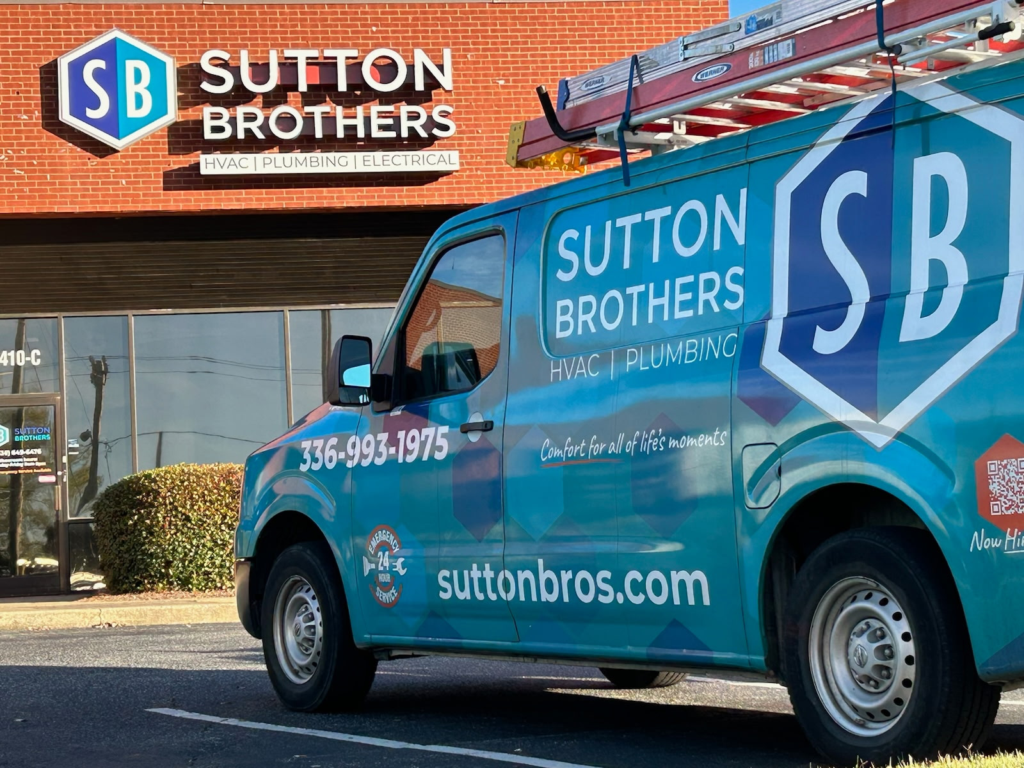 Sutton Brothers branded truck parked outside our second location building in Greensboro, NC, where our physical showroom is located.