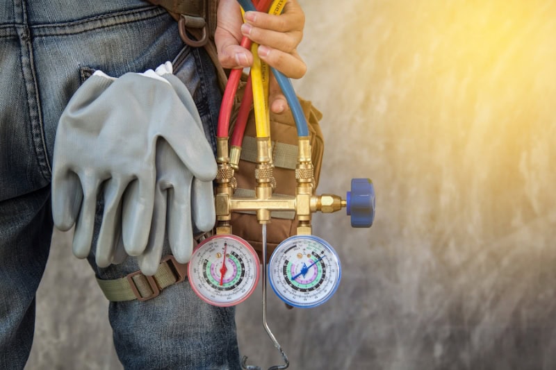 Air Conditioning Technician and A part of preparing to install new air conditioner.