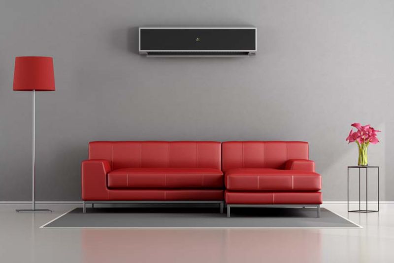 Image of a ductless system above a couch. Planning to Remodel? Go Ductless!.
